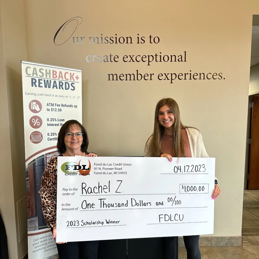 Rachel Z 2023 Scholarship Winner holding giant check