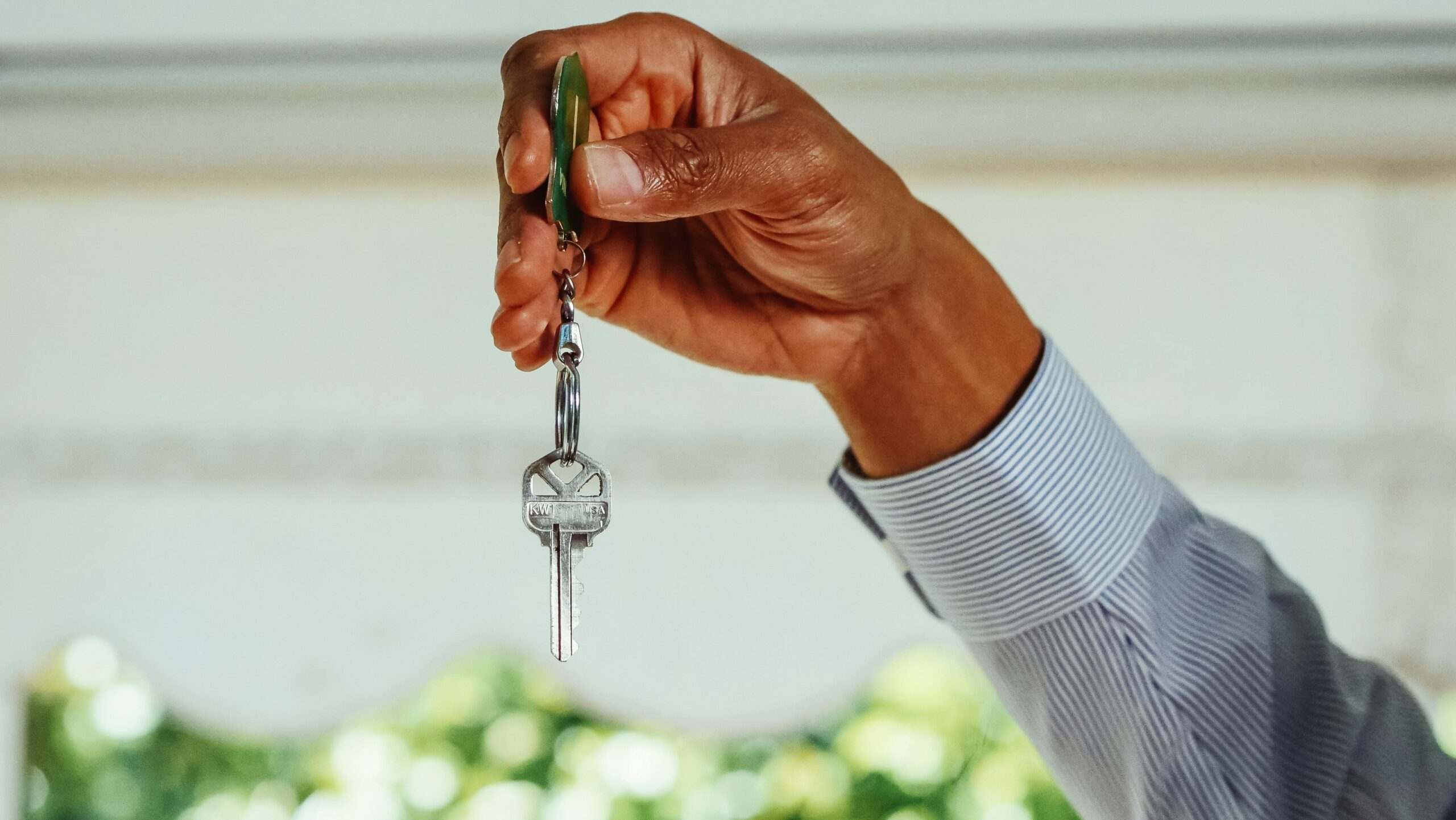 Person holding house keys