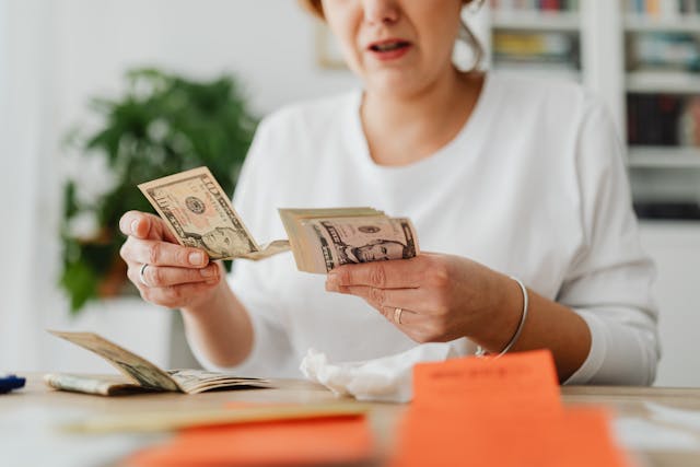 Person holding money