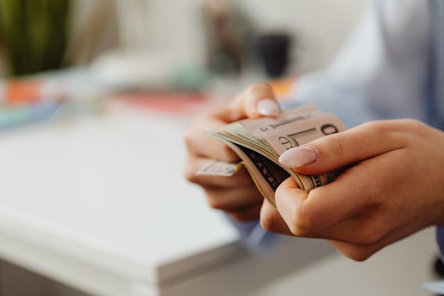 Person holding money